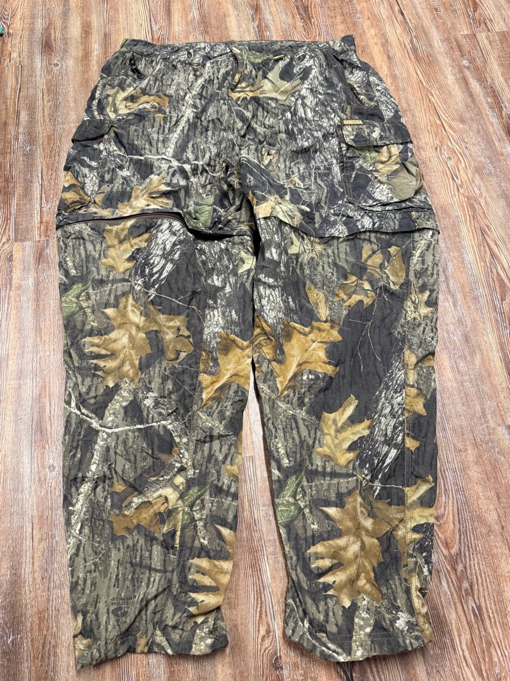 Remington camo cargo pants with adjustable waist and leg openings can zip off in